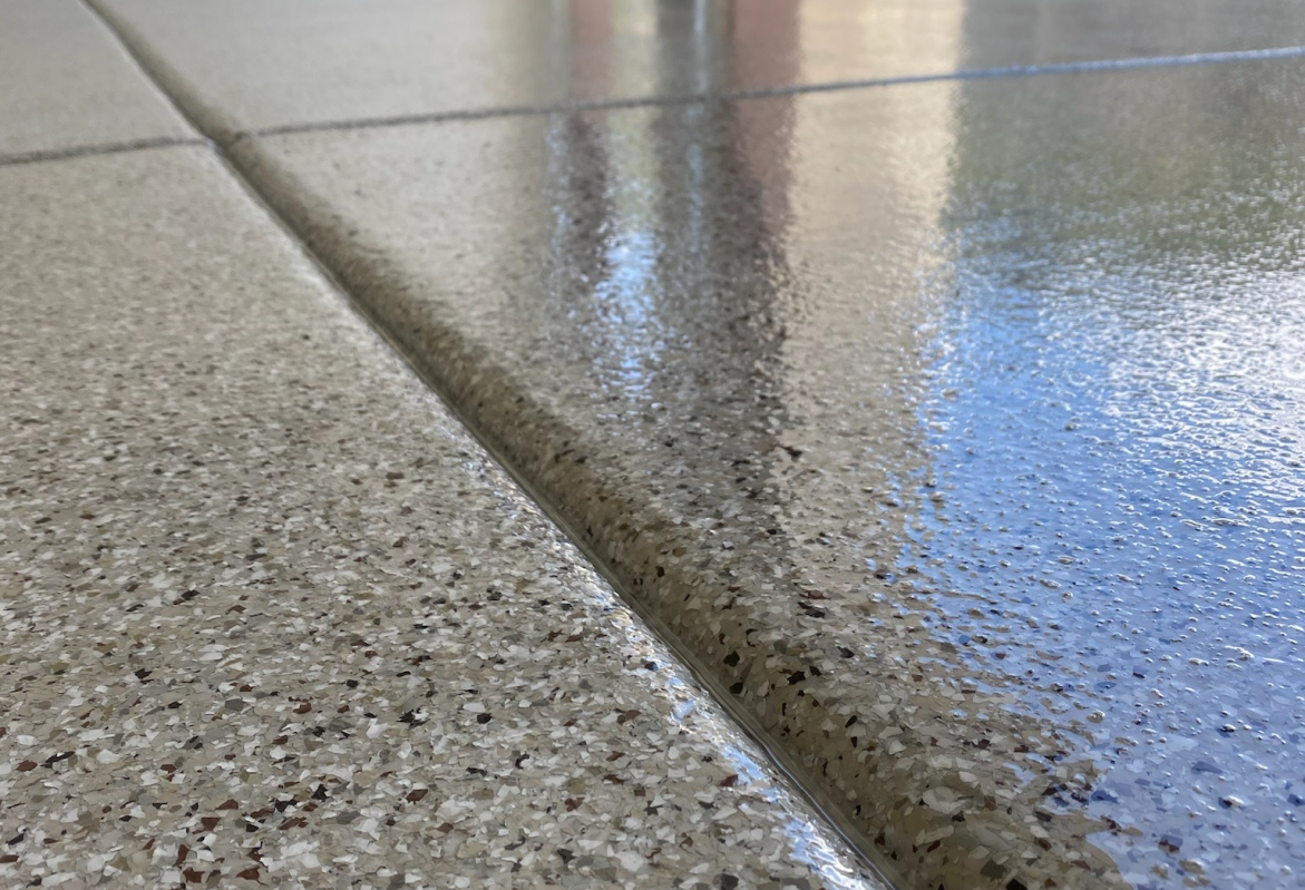 River Bed flake epoxy garage floor by Lifetime Coatings