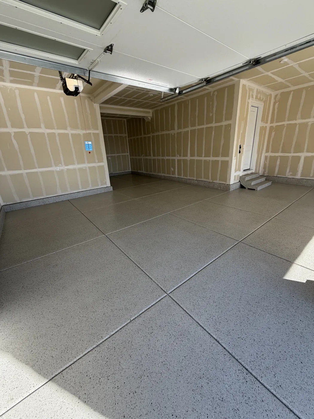 Dune flake epoxy garage floor by Lifetime Coatings