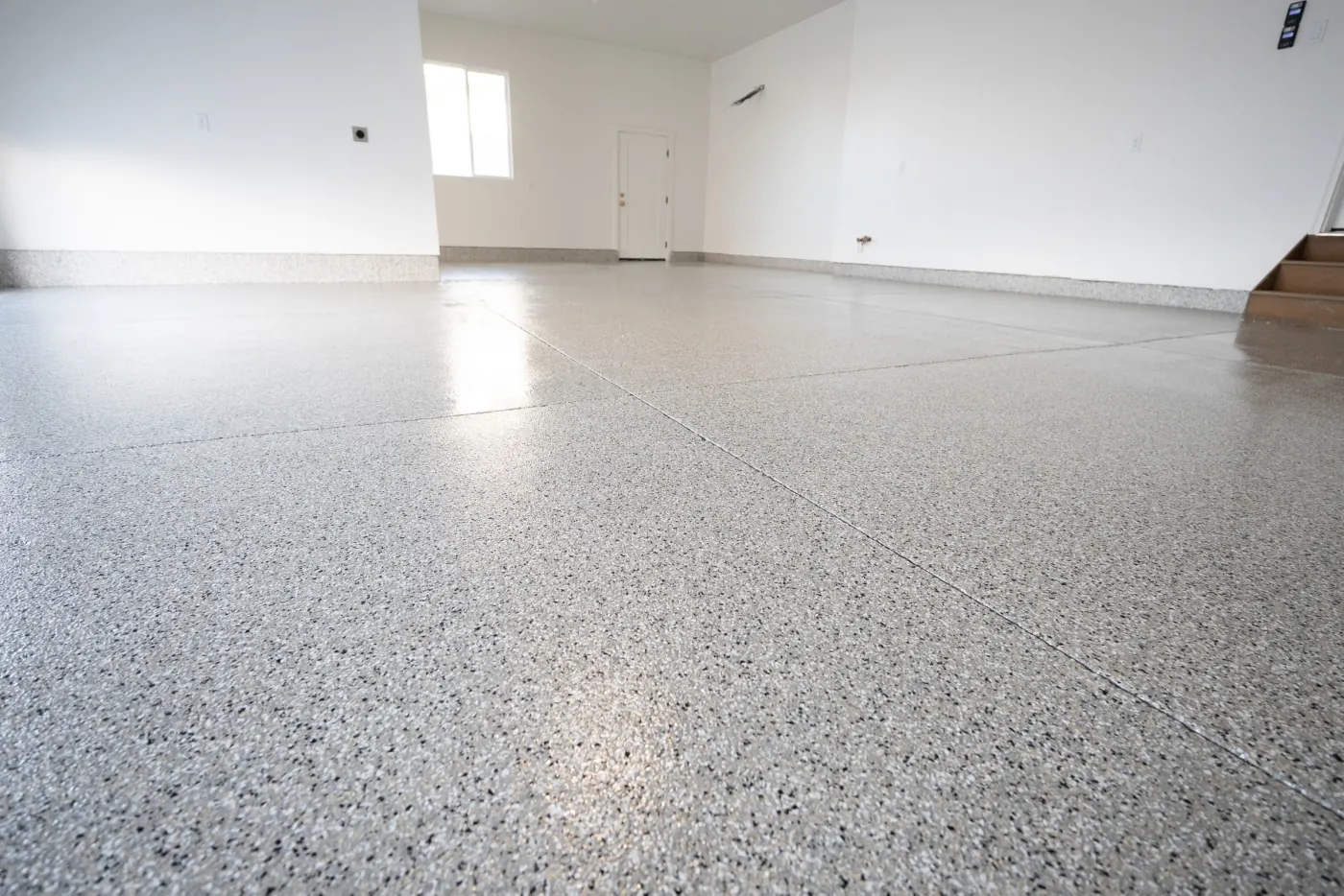 Fallout flake epoxy garage floor by Lifetime Coatings