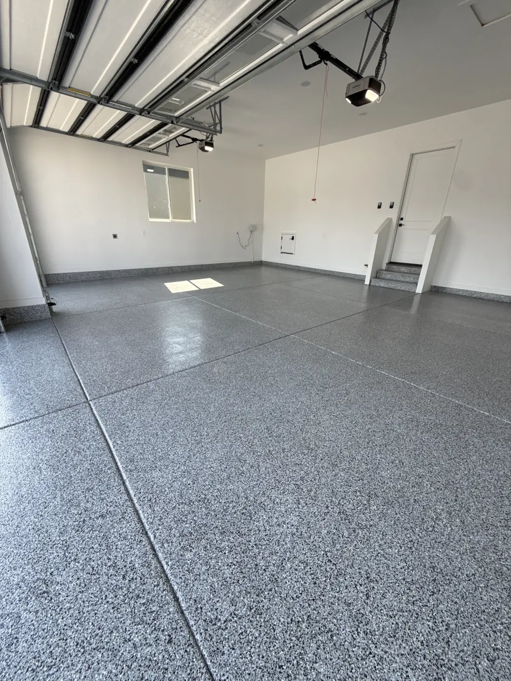 Marble flake epoxy garage floor by Lifetime Coatings