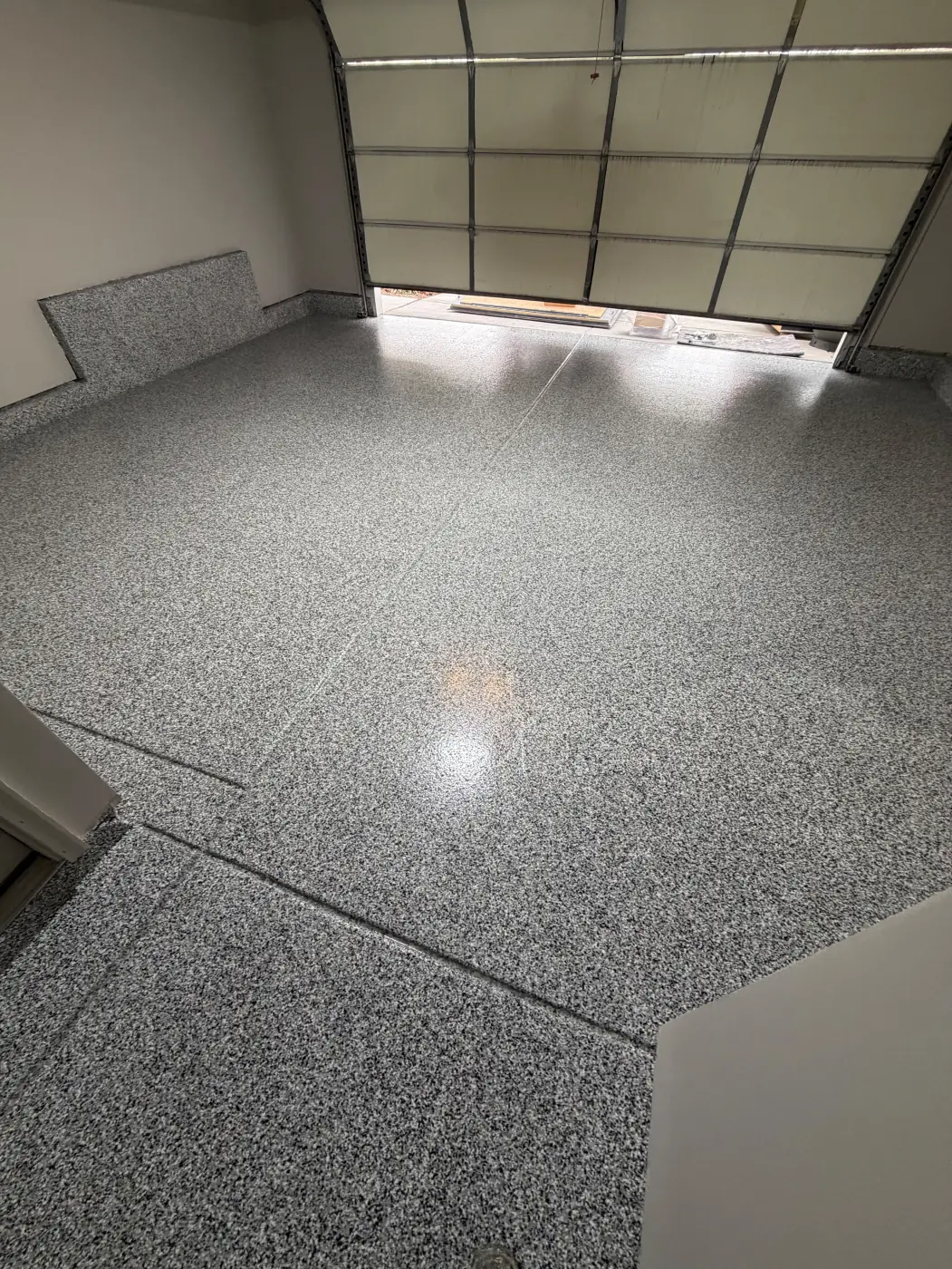 Marble flake epoxy garage floor by Lifetime Coatings