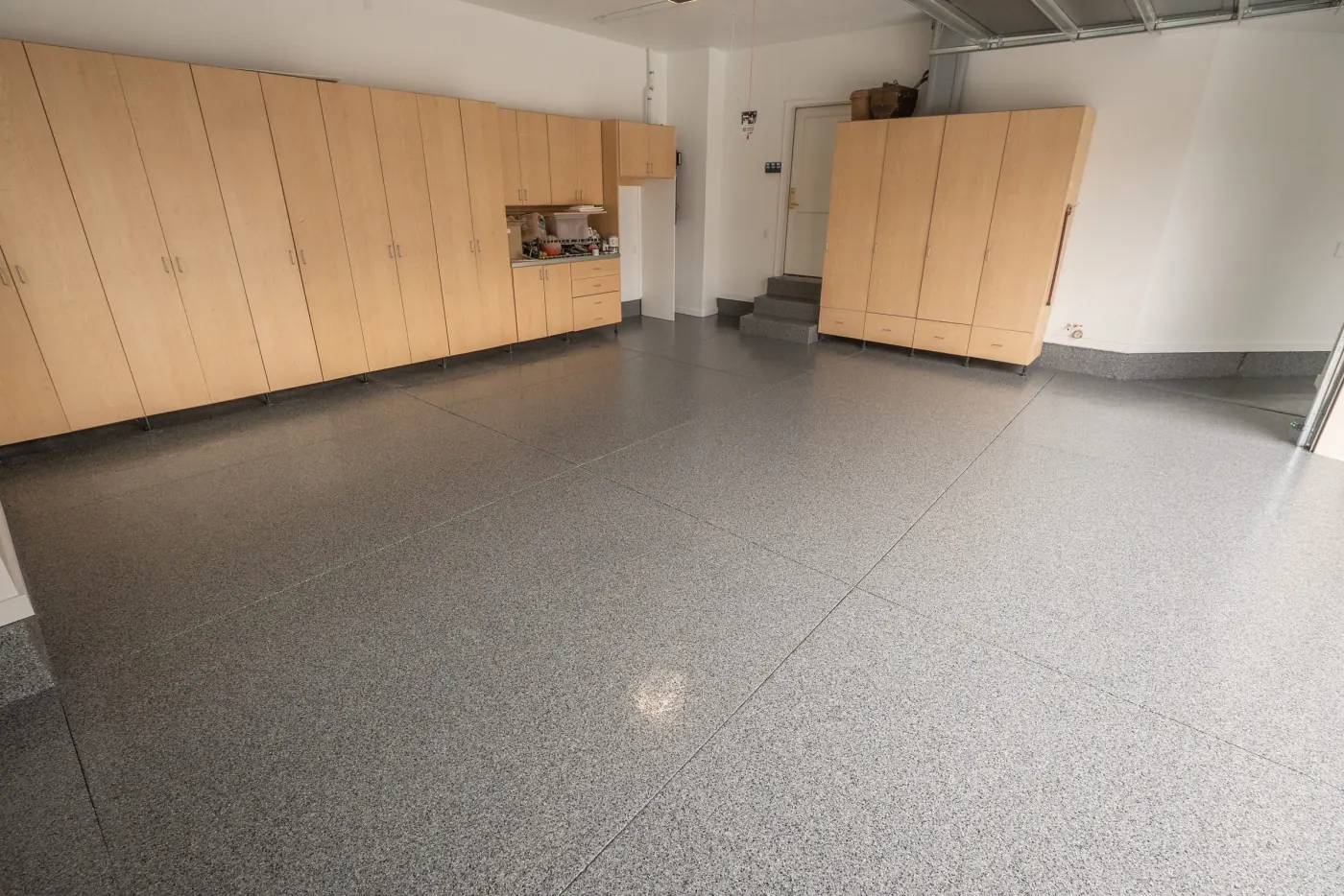 Midnight flake epoxy garage floor by Lifetime Coatings