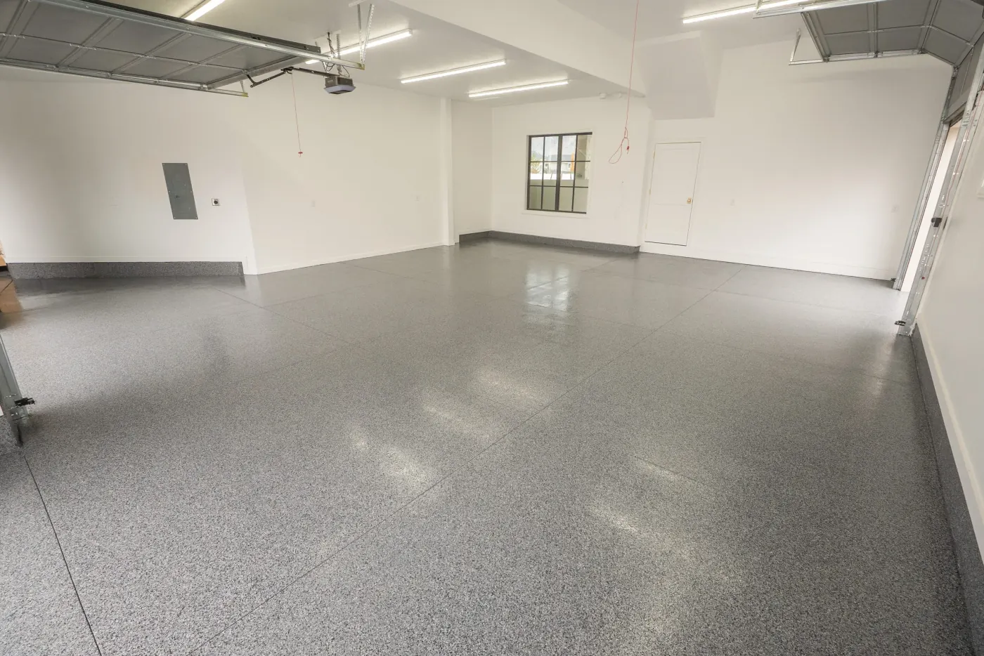 Midnight flake epoxy garage floor by Lifetime Coatings