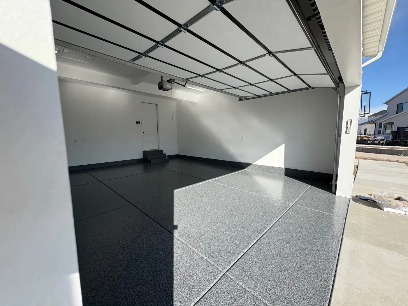 Midnight flake epoxy garage floor by Lifetime Coatings