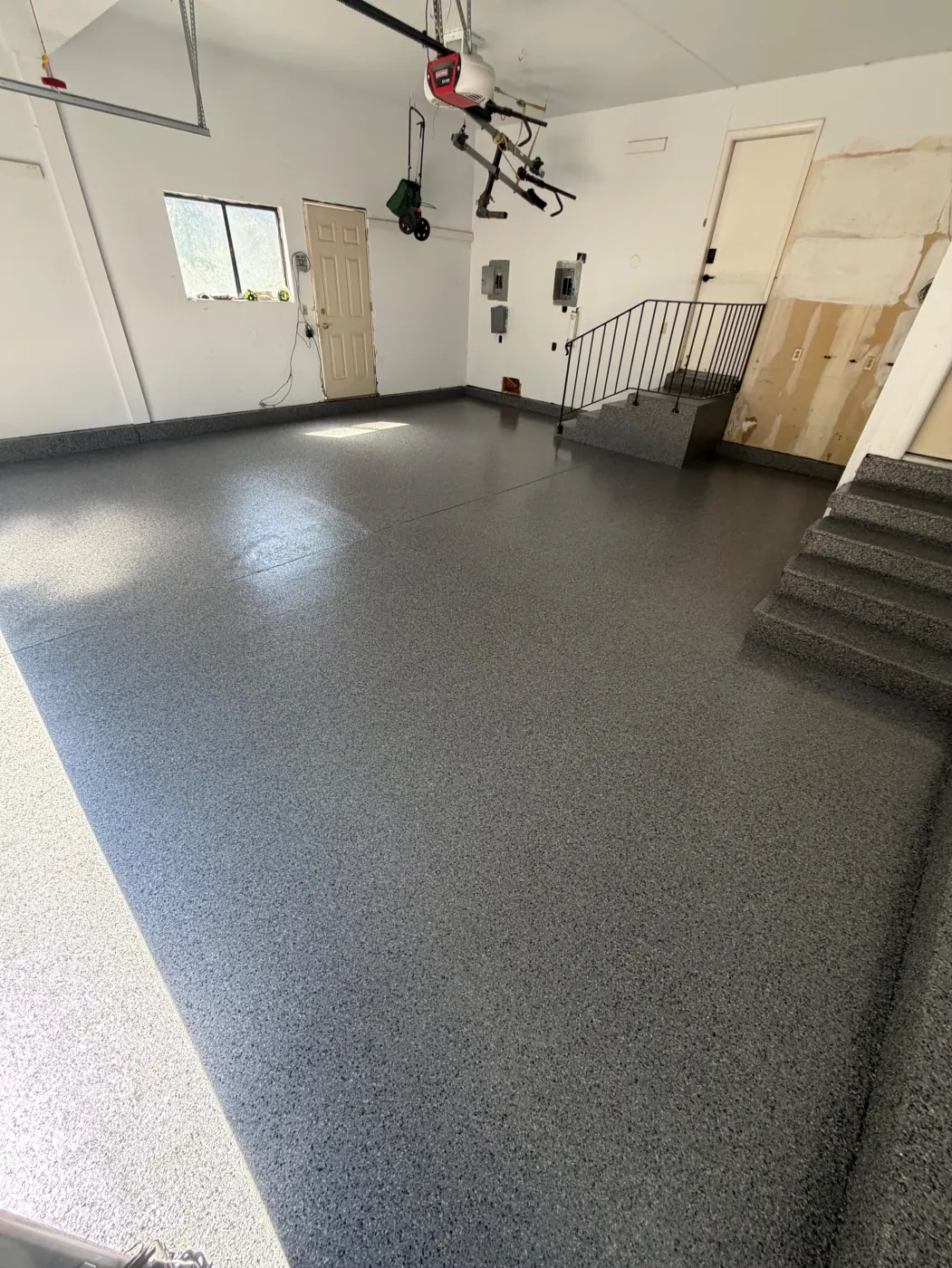 Midnight flake epoxy garage floor by Lifetime Coatings