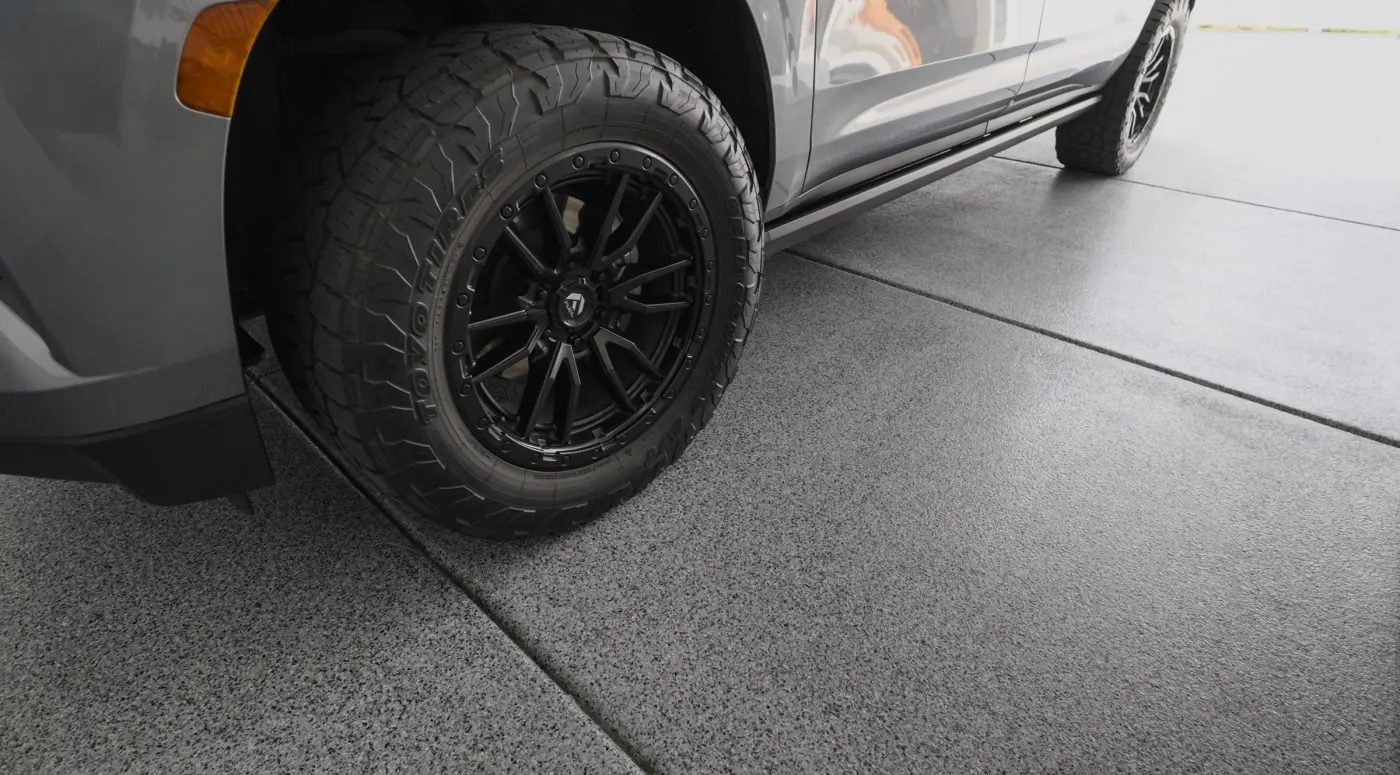 Midnight flake epoxy garage floor by Lifetime Coatings