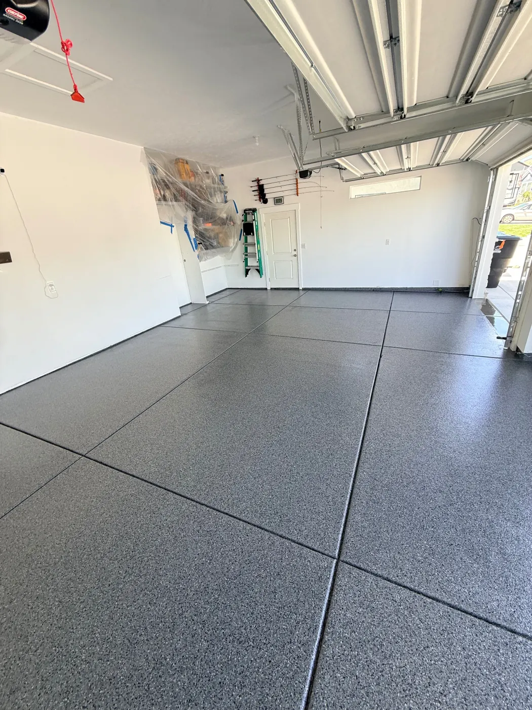 Midnight flake epoxy garage floor by Lifetime Coatings
