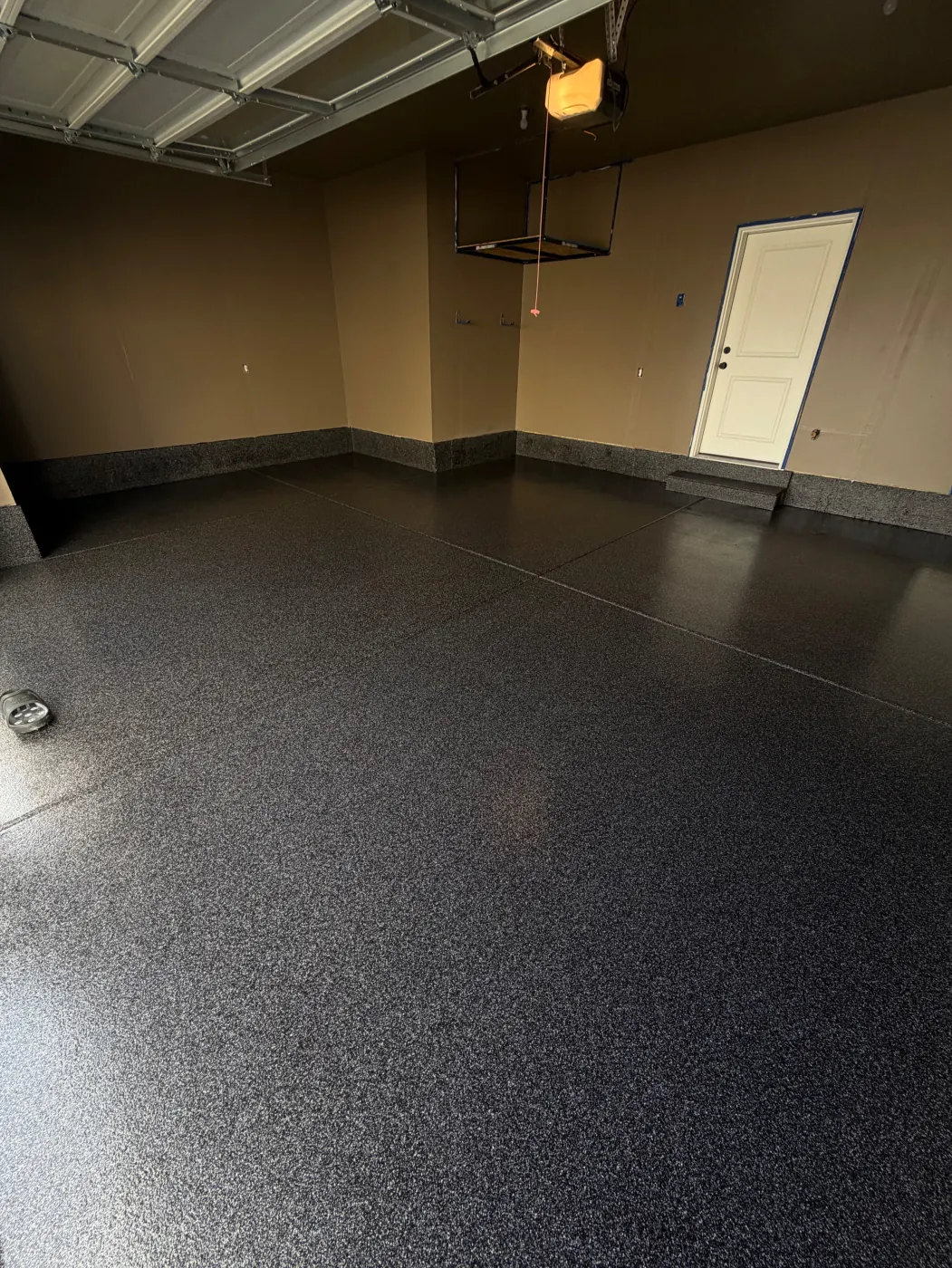 Void flake epoxy garage floor by Lifetime Coatings