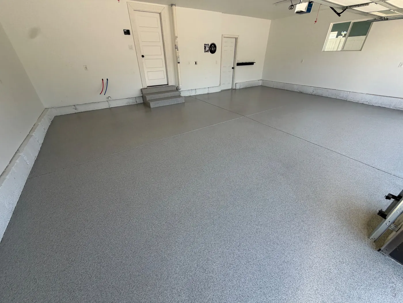 Quartz flake epoxy garage floor by Lifetime Coatings