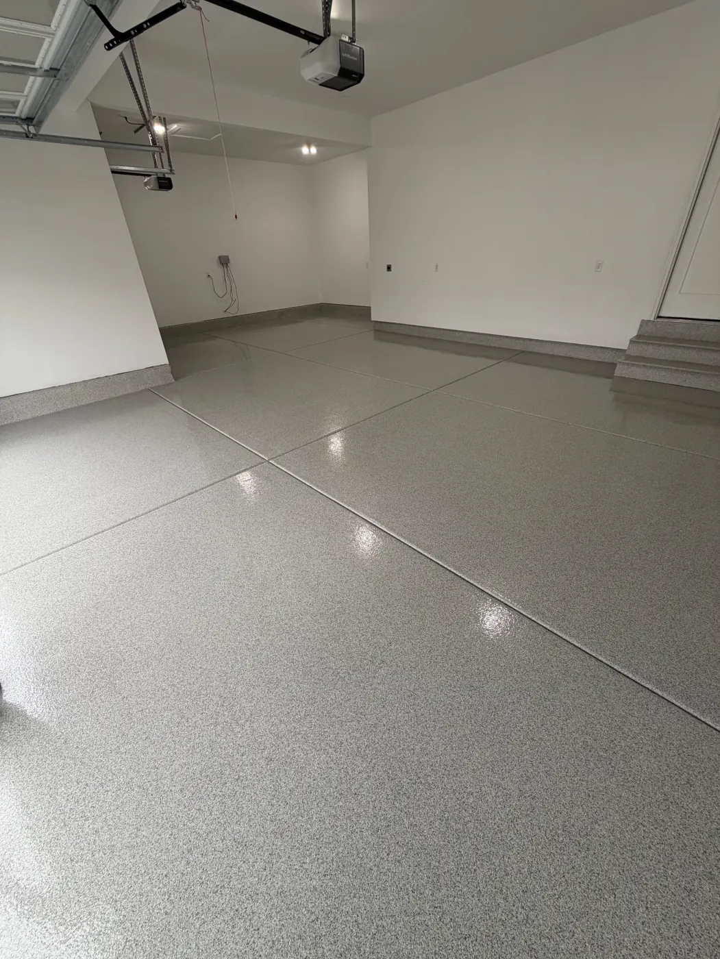 Quartz flake epoxy garage floor by Lifetime Coatings