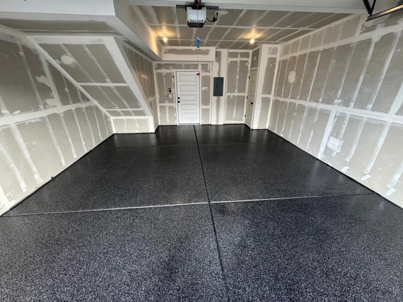 Void flake epoxy garage floor by Lifetime Coatings