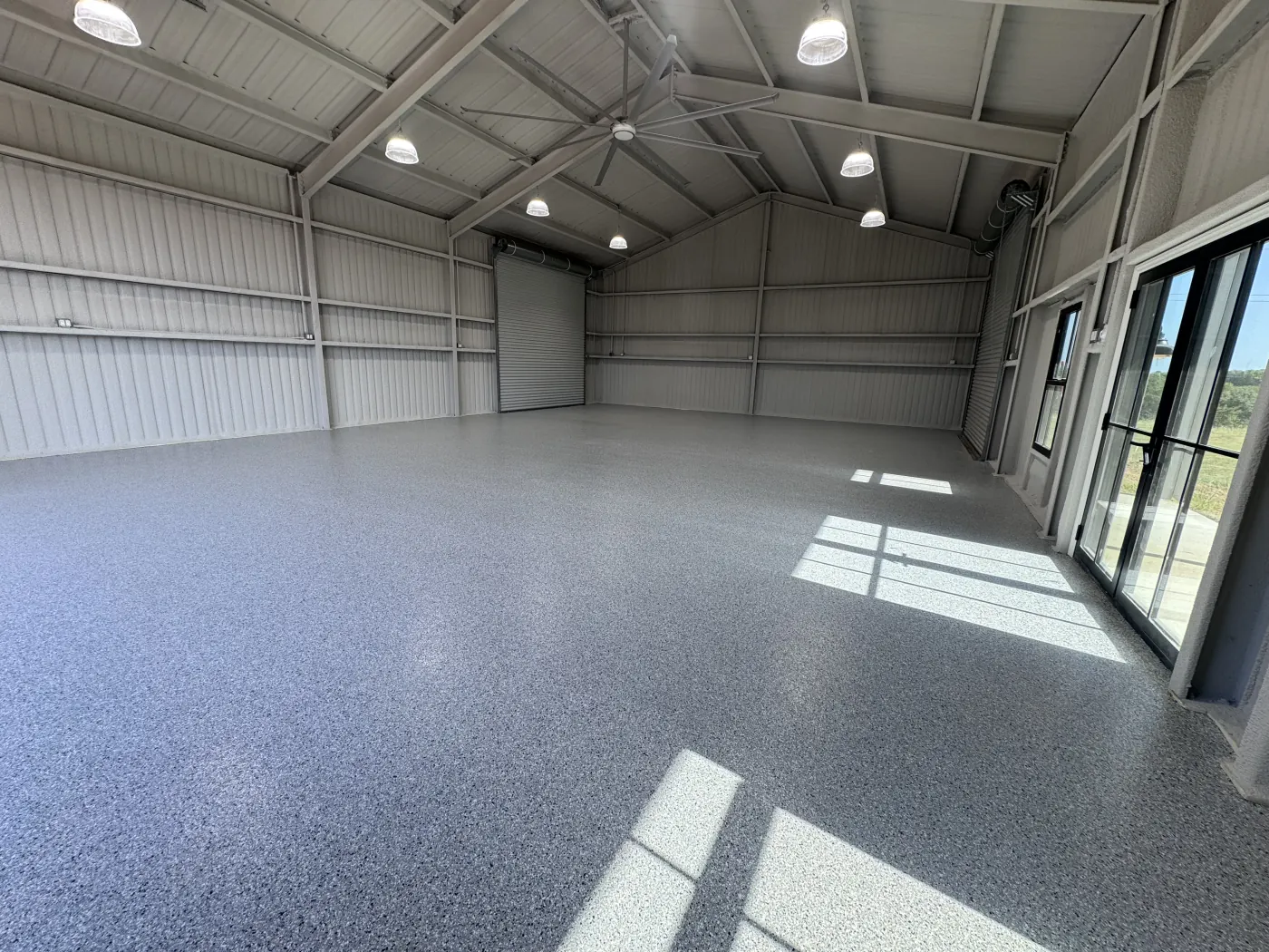 White Water flake epoxy garage floor by Lifetime Coatings