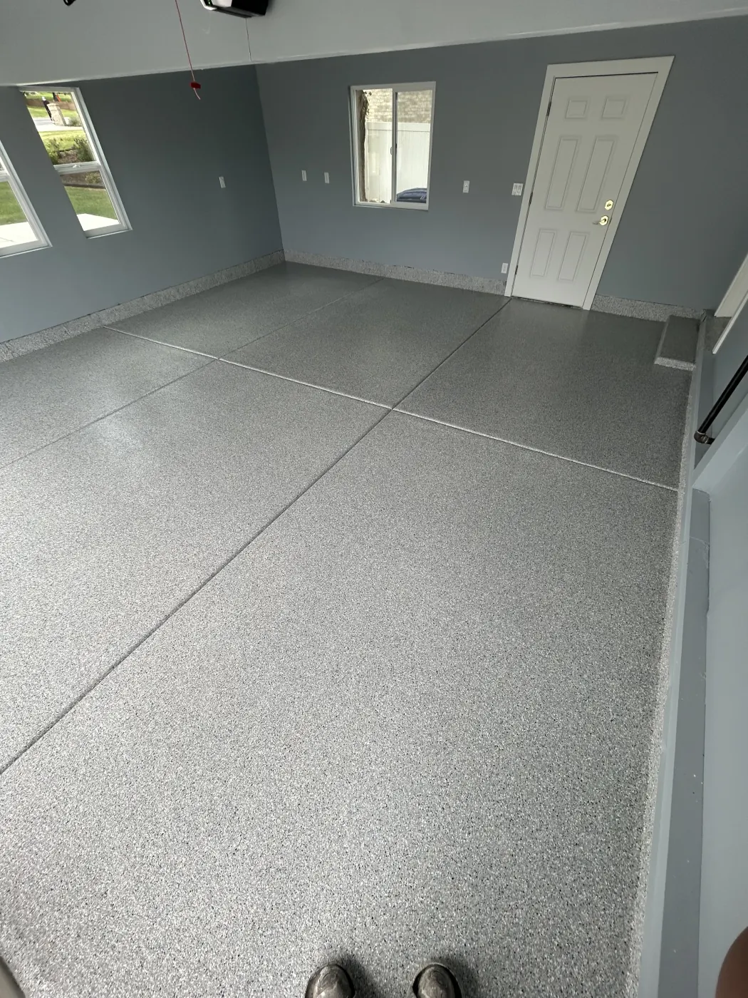 White Water flake epoxy garage floor by Lifetime Coatings