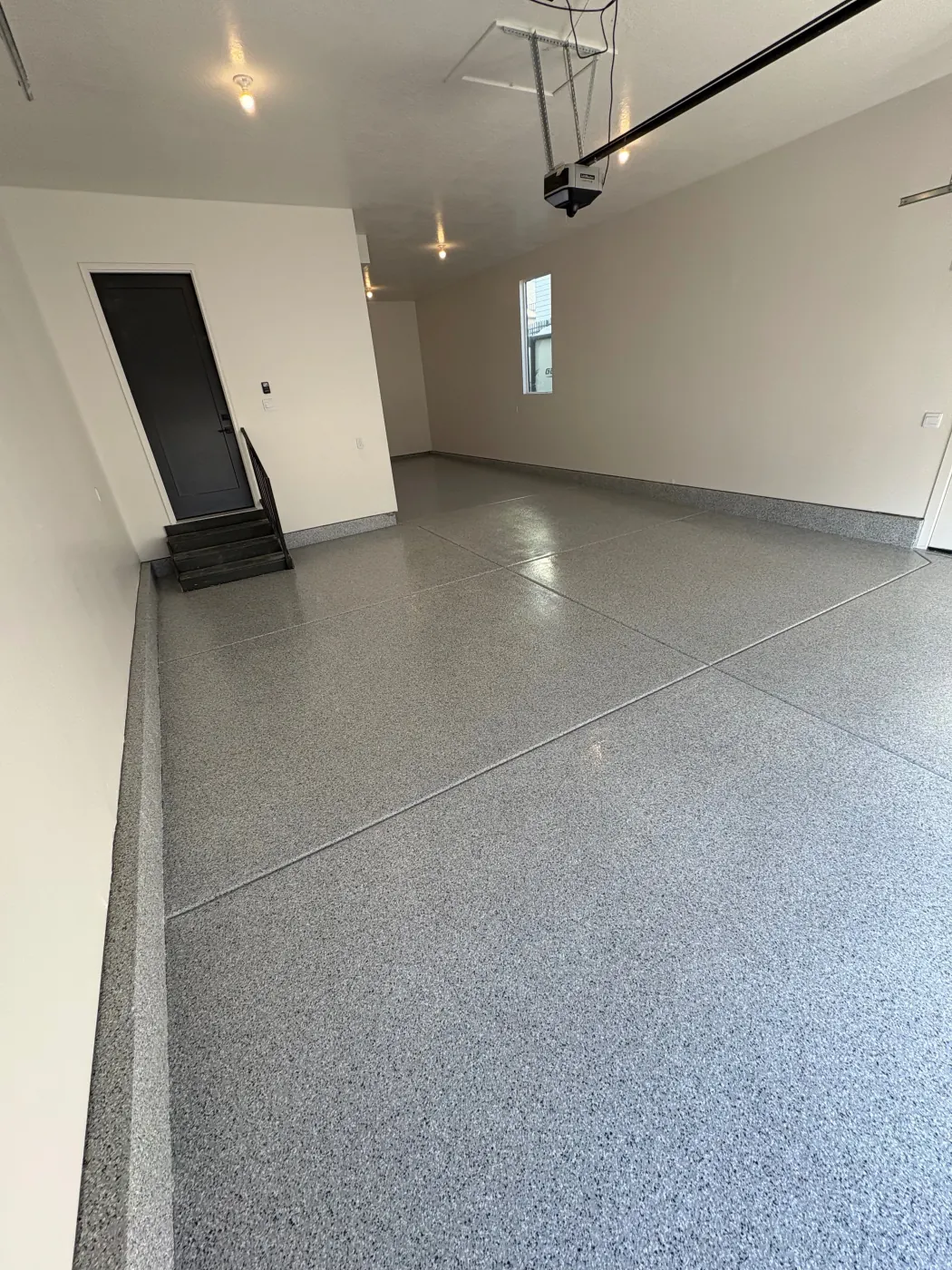 White Water flake epoxy garage floor by Lifetime Coatings