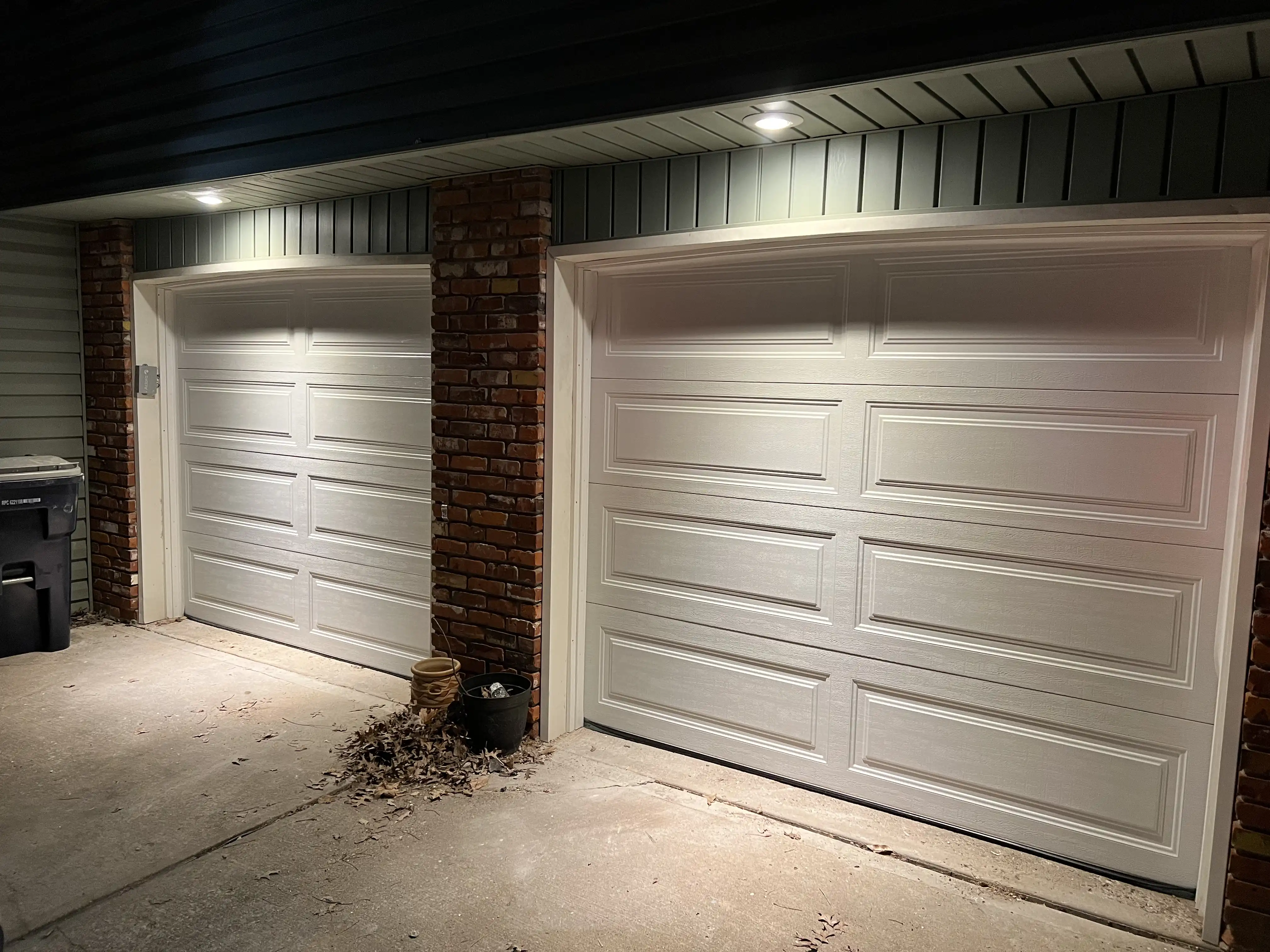 New garage door installed by Valhalla Door on a home in Gladstone, MO — finished exterior view