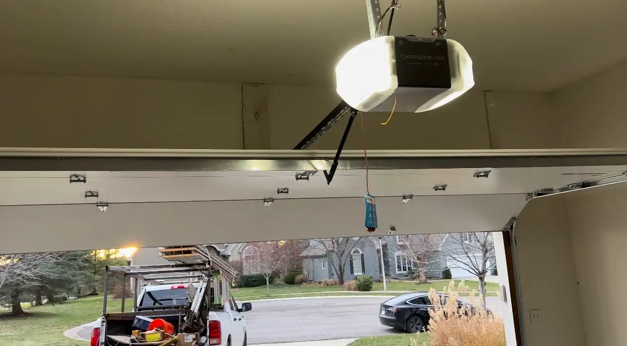 Garage door and opener installation seen from inside a Lenexa, KS garage