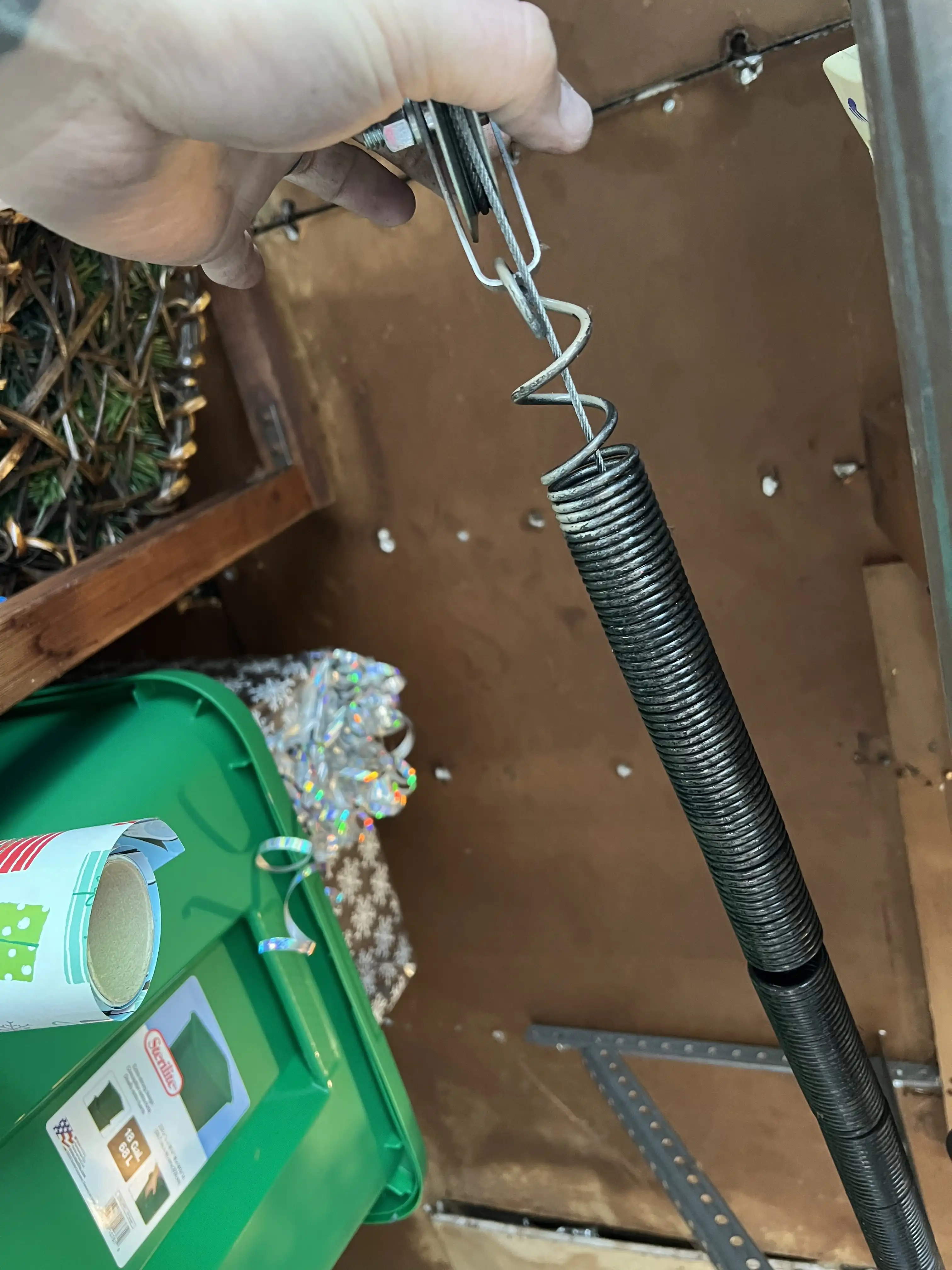 Stretched-out extension spring on a garage door in Belton, MO before replacement