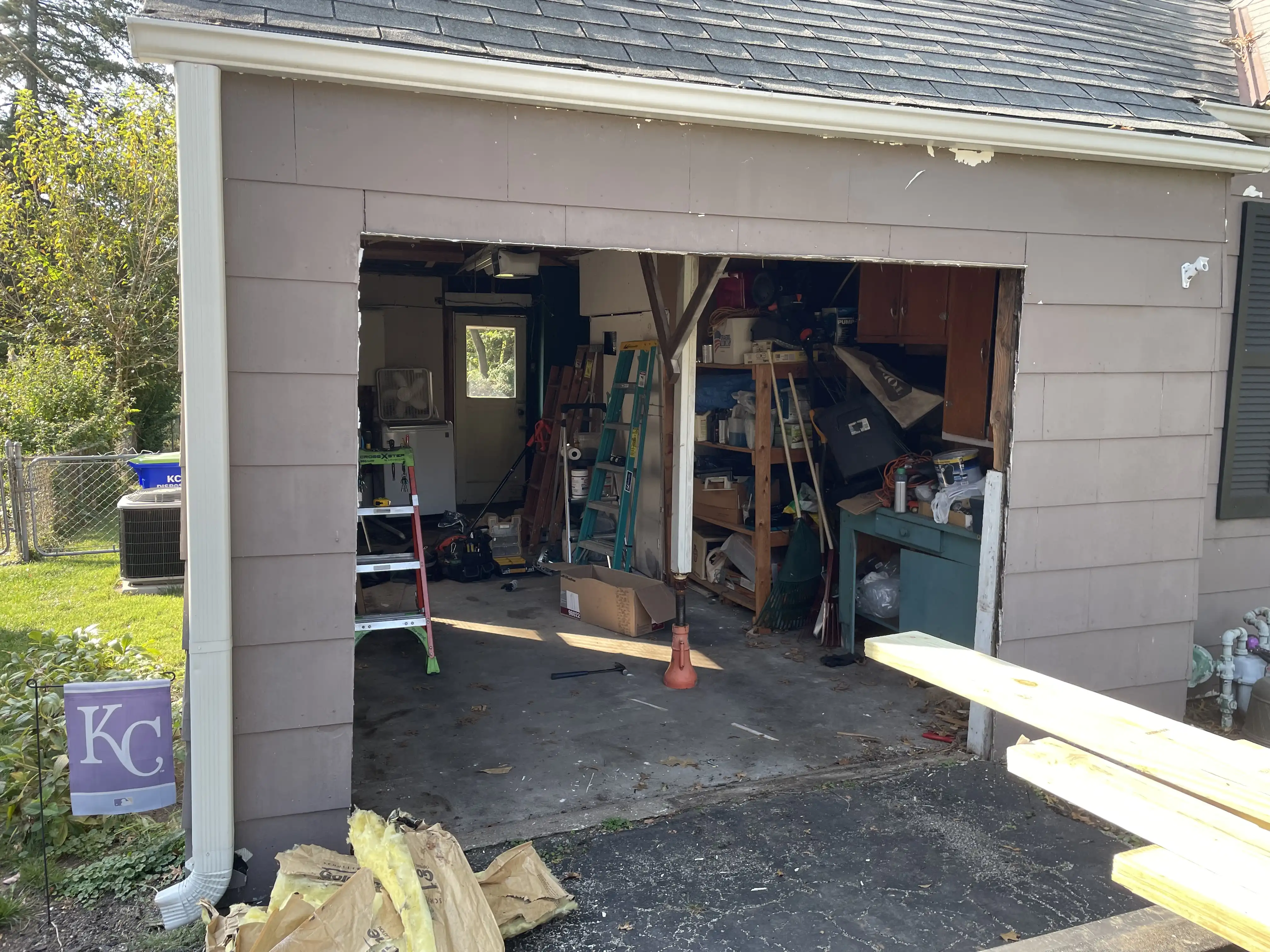 Garage door opening re-framed during installation in Mission, KS