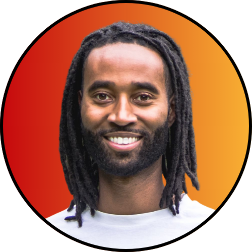 Dr Lewis Thomas, sickle cell educator and founder of Sickleverse, smiling portrait