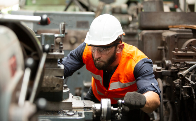 engineer in ppe working on site