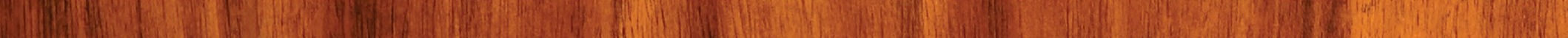 Close-up of rich brown wooden surface with natural grain and texture patterns.