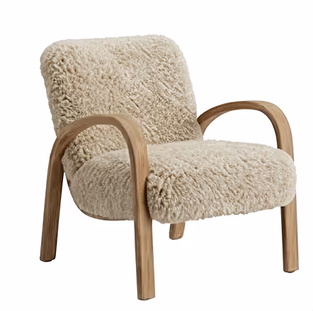 Beige plush upholstered armchair with curved wooden legs and armrests.