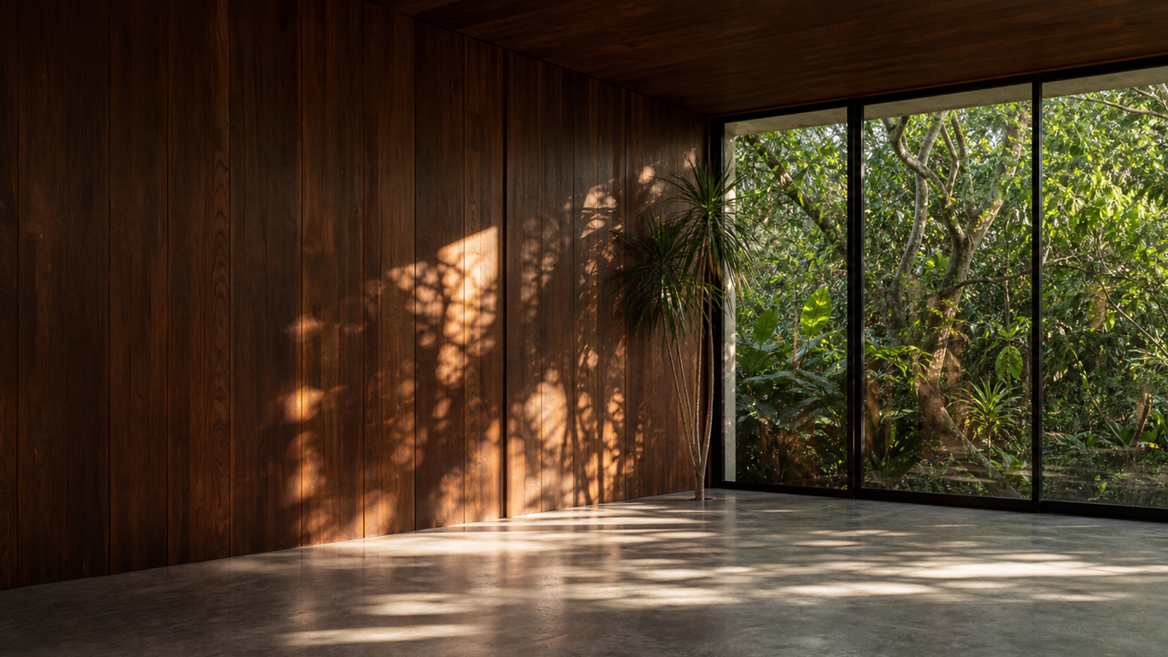 Floor-to-ceiling windows looking onto greenery