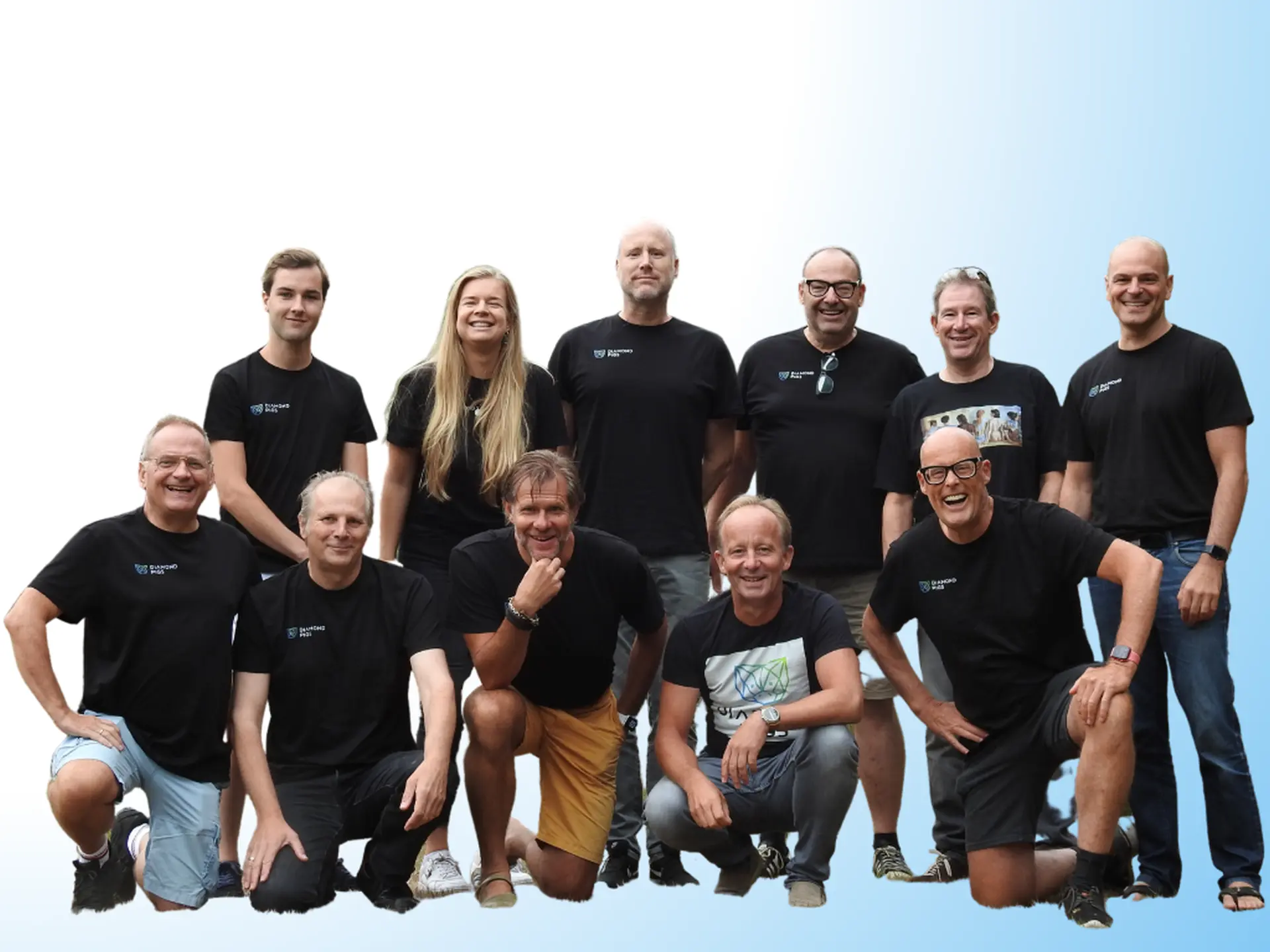 a group of men and women posing for a picture