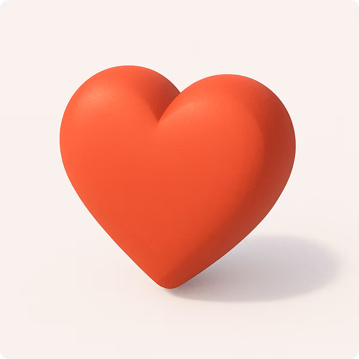 3D red heart shape casting a shadow on a light background.