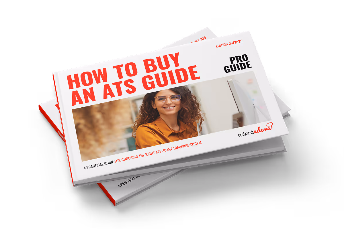 Stack of booklets titled 'How to Buy an ATS Guide' featuring a smiling woman with glasses on the cover.