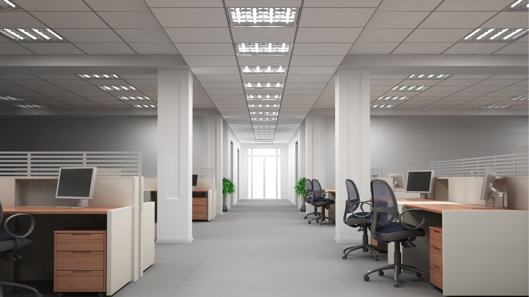 Open-space de bureau vide en été, lumière naturelle traversant de grandes baies vitrées, quelques bureaux rangés et propres, ambiance calme et lumineuse, aucune présence humaine, sol brillant.
