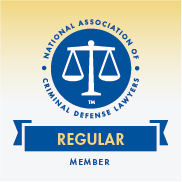 Seal of the National Association of Criminal Defense Lawyers with the words Regular Member in a blue banner below the scales of justice.
