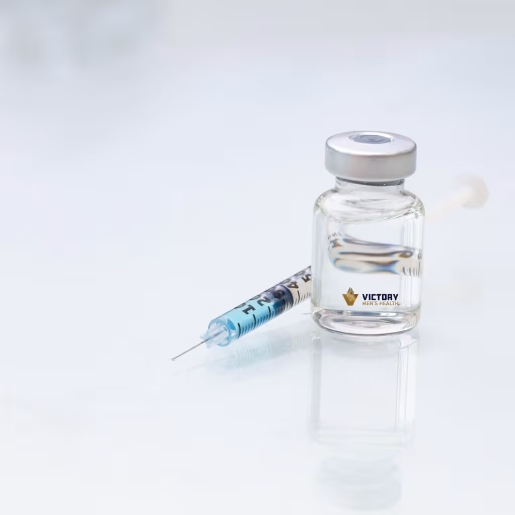 Bottle of testosterone and injection needle