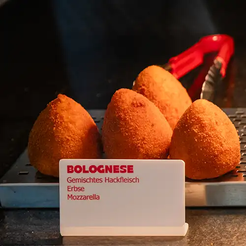 Italian style pizza with fresh cheese, herb, and small colourful tomatoes