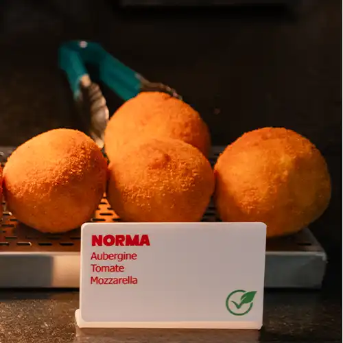 Italian style pizza with fresh cheese, herb, and small colourful tomatoes