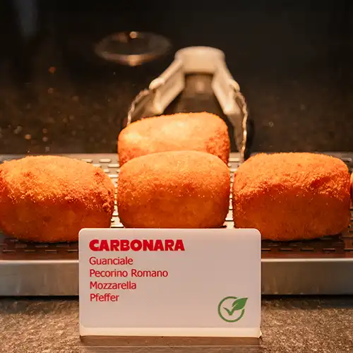 Italian style pizza with fresh cheese, herb, and small colourful tomatoes