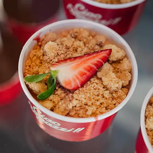 Italian style pizza with fresh cheese, herb, and small colourful tomatoes
