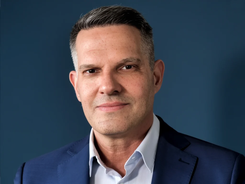 Andrew Altschuler, Co-Founder, President, CEO and Chairman, a man with short grey hair in a blue blazer