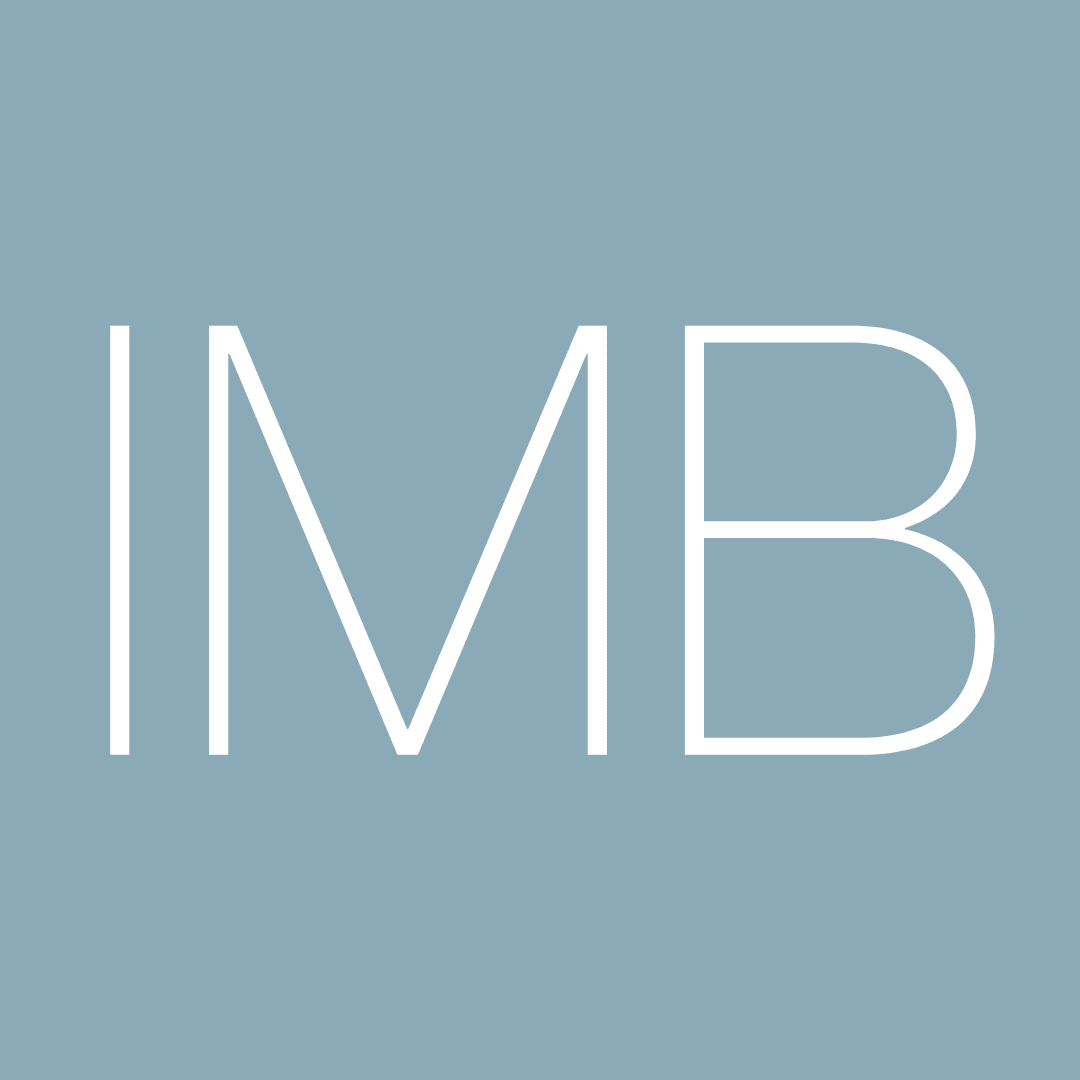 White IMB letters on a blue-grey square background.