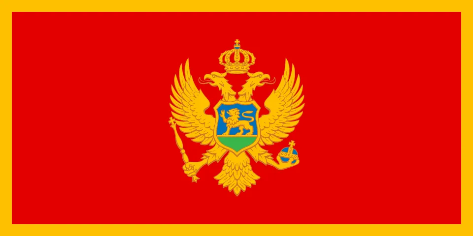 Drapeau du Monténégro avec un fond rouge et un aigle bicéphale doré tenant un sceptre et un globe.