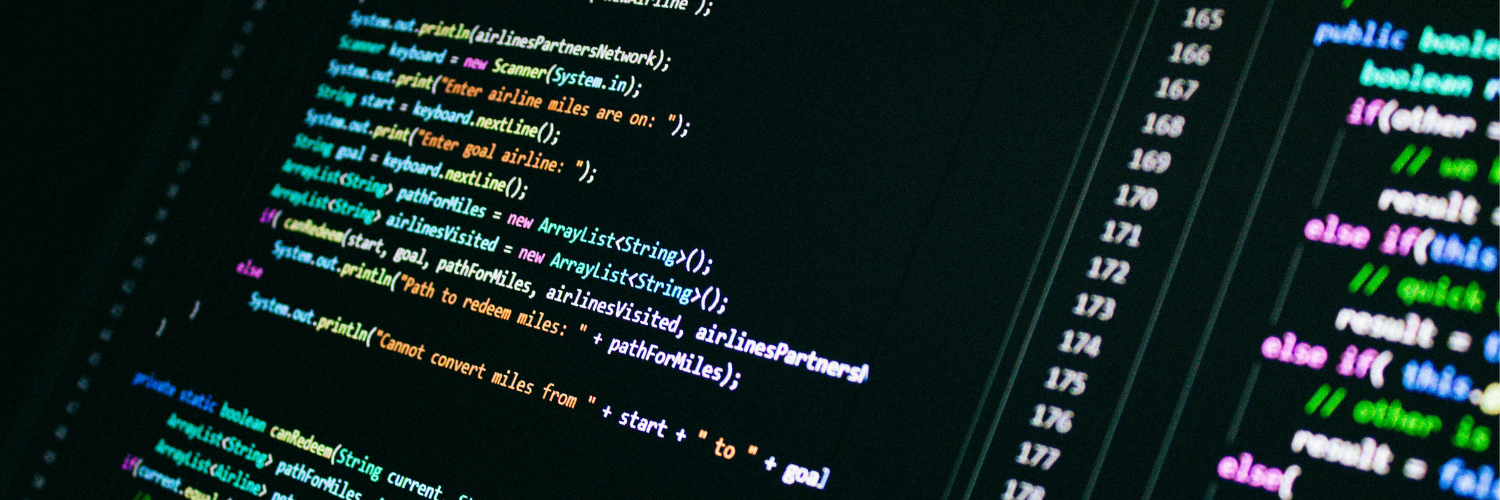 Close-up of colorful programming code on a dark screen with line numbers visible.