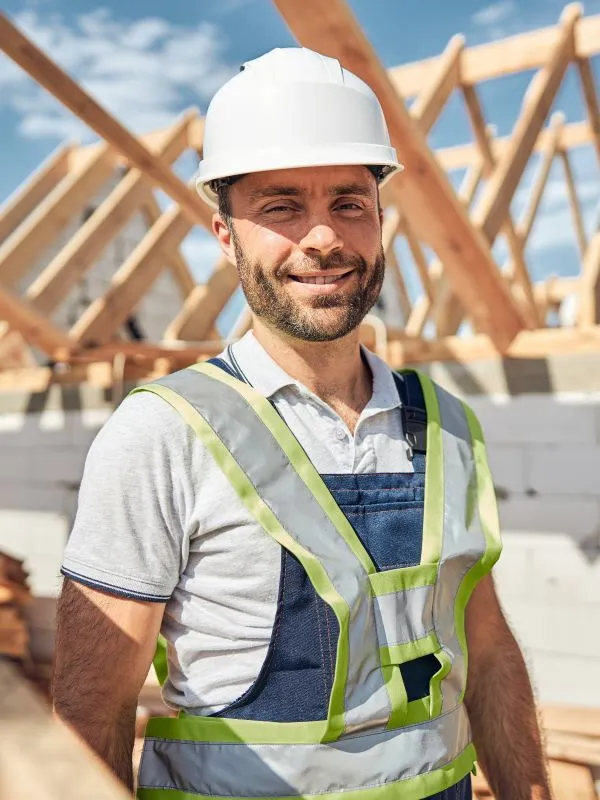 a man wiping a cupboard clean