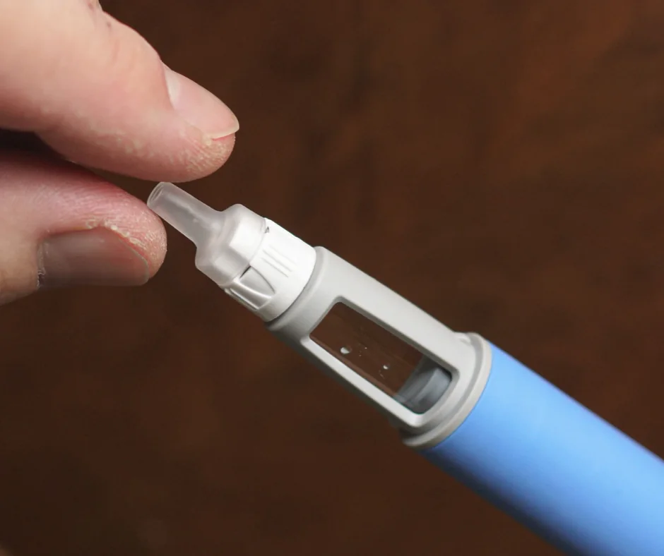 Close-up of a weight loss injection pen