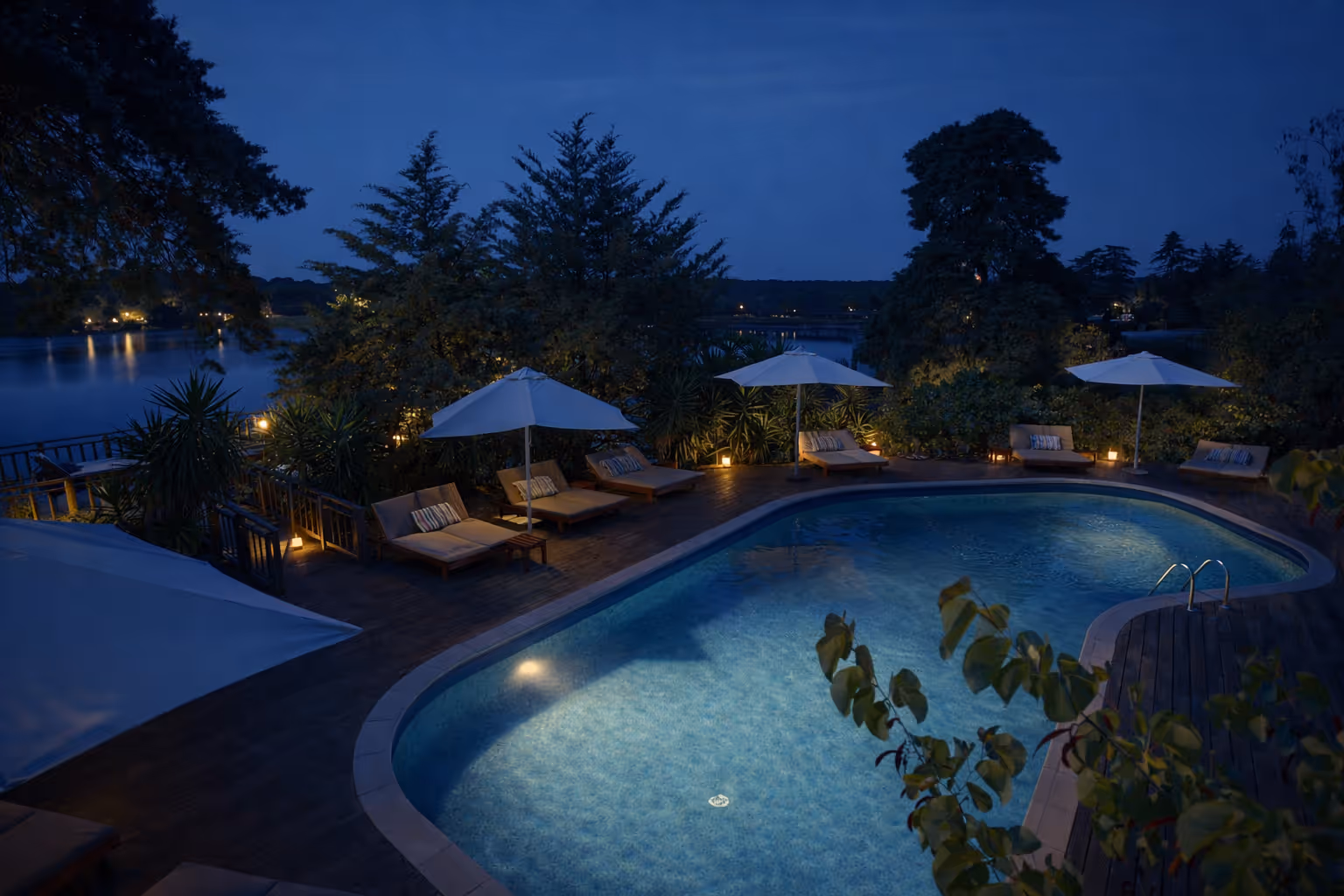 Hotel Vale do Gaio pool overlooking the lake at dusk