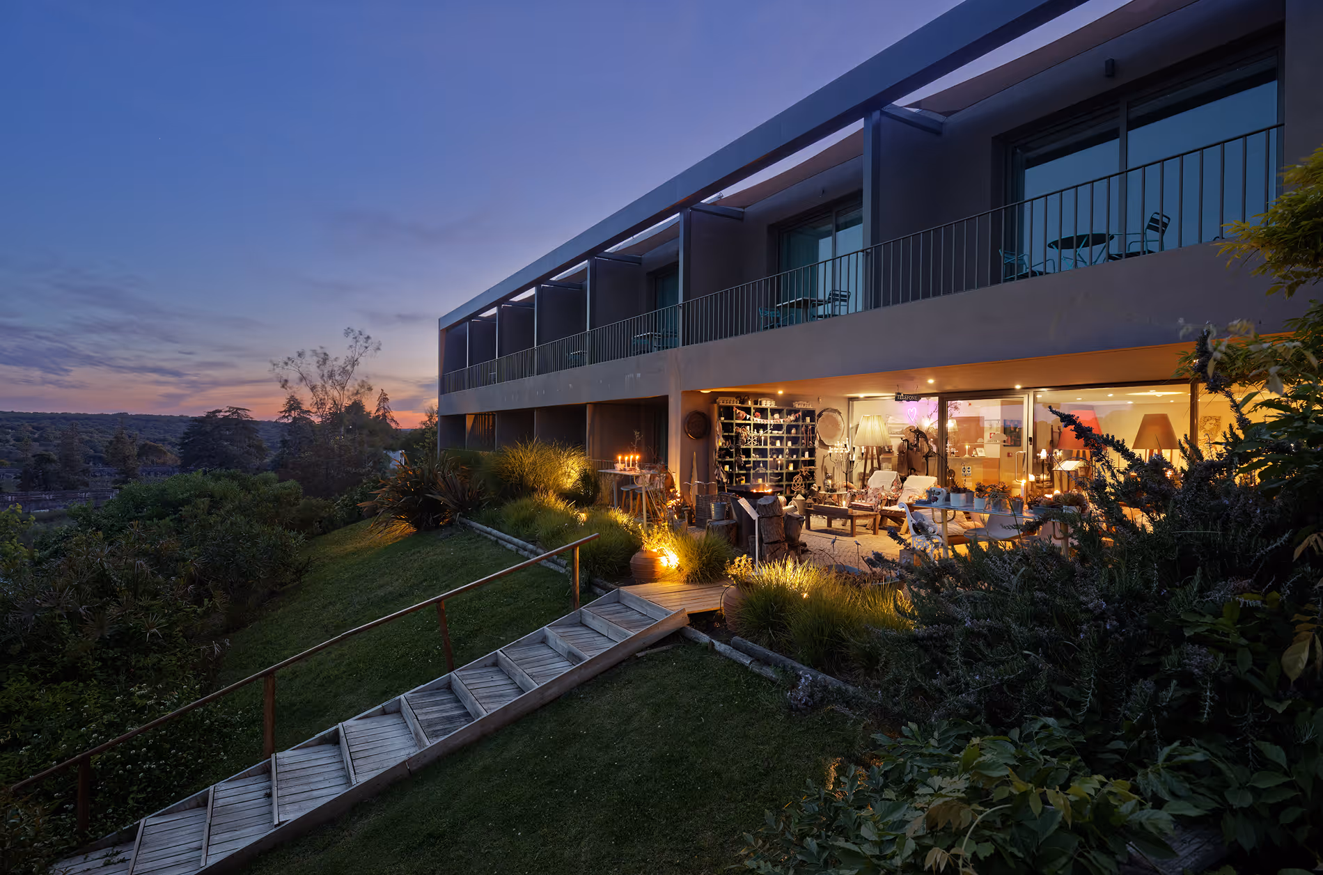 Hotel terrace illuminated at dusk