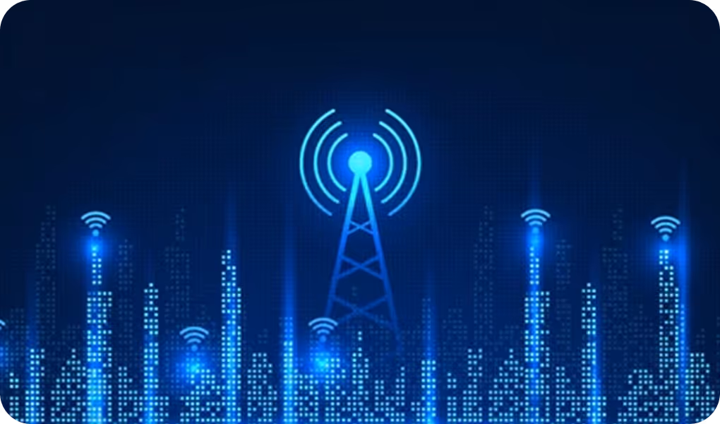 Blue digital cityscape with illuminated buildings and central communication tower emitting wireless signals.