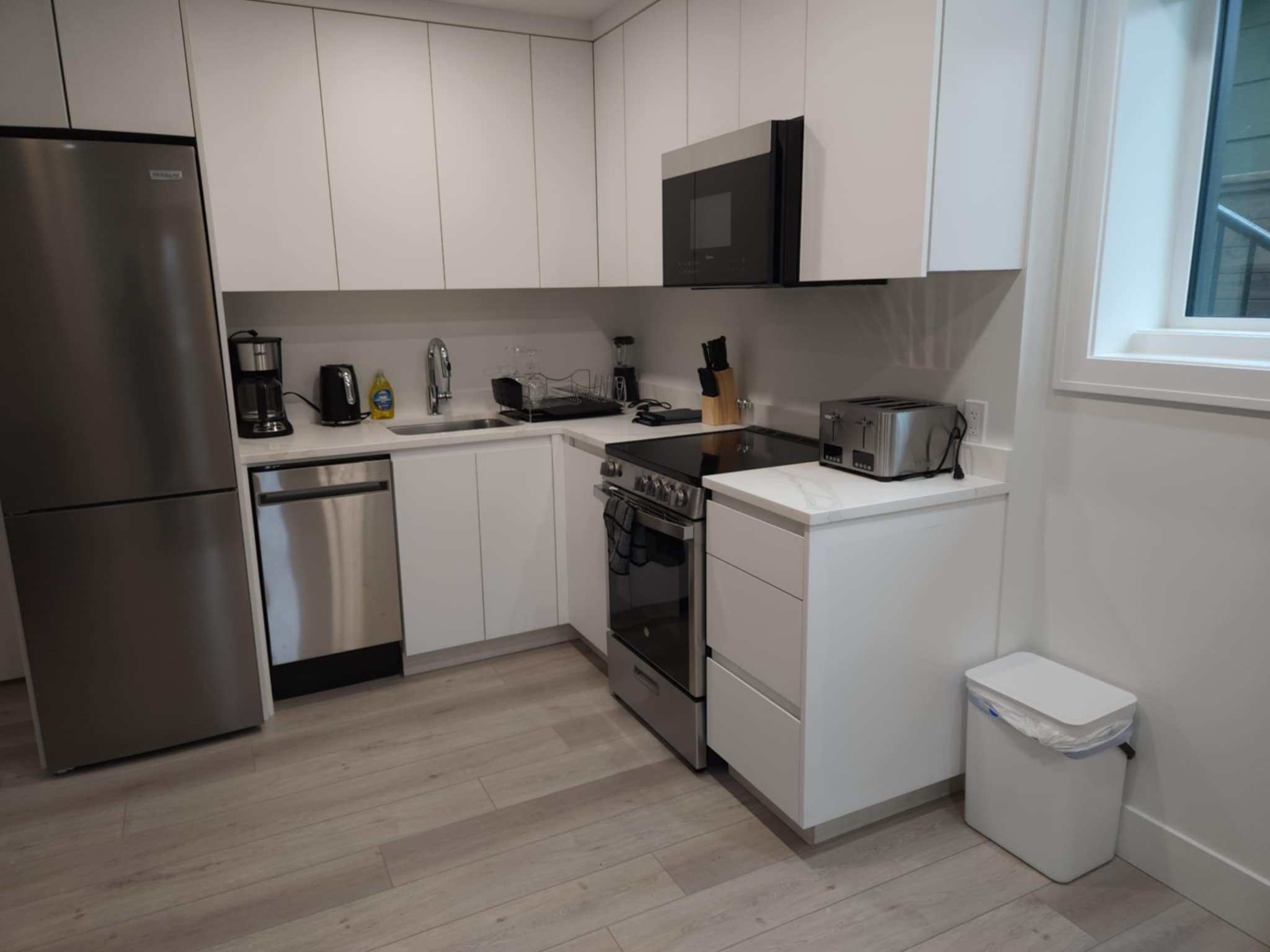 [background image] image of office workspace with desks (for a film production company)