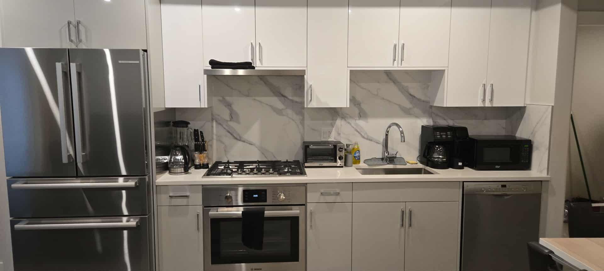 [background image] image of office workspace with desks (for a film production company)