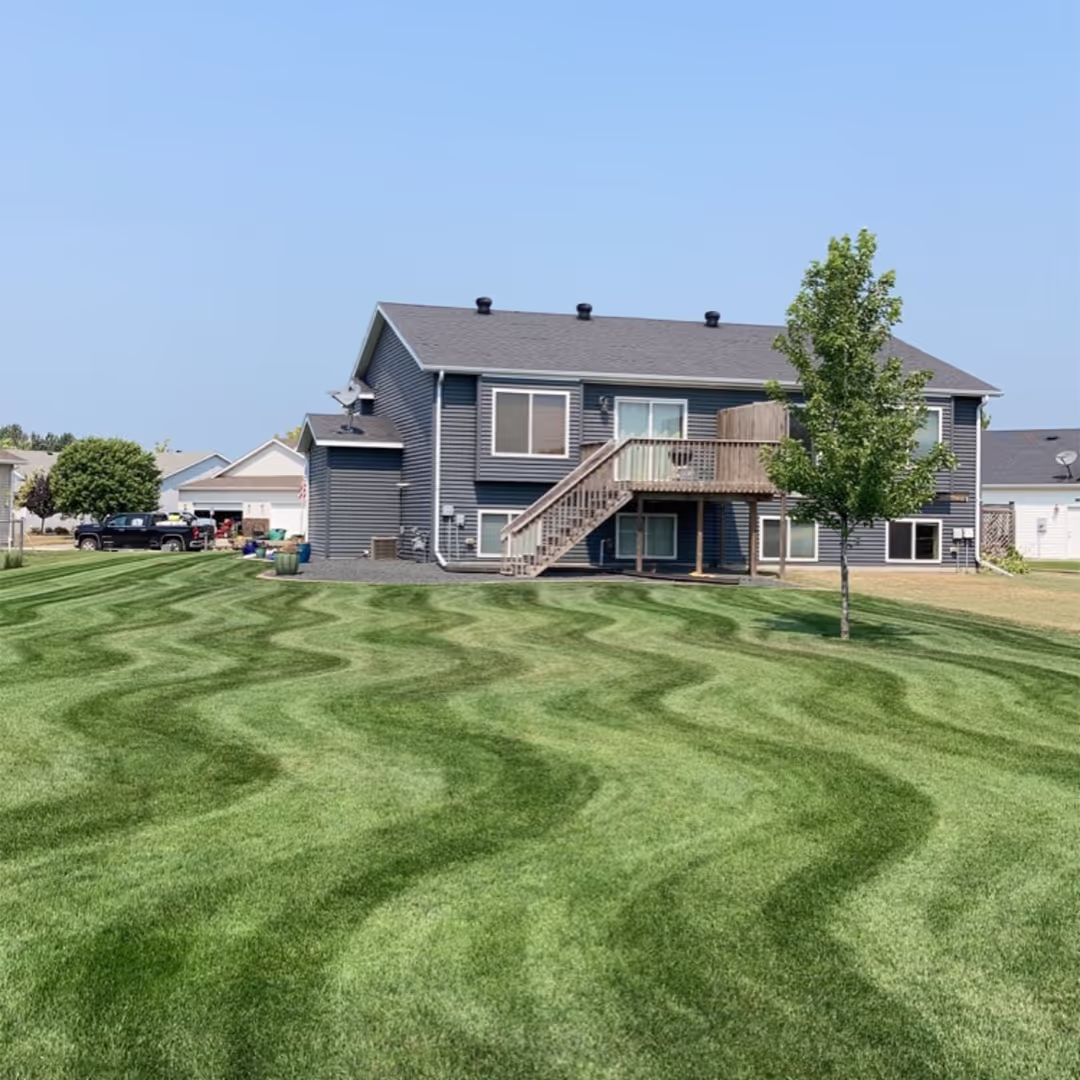 Freshly mowed lawn by Musolf Property Maintenance in Lake Park, Minnesota providing weekly lawn care services near me
