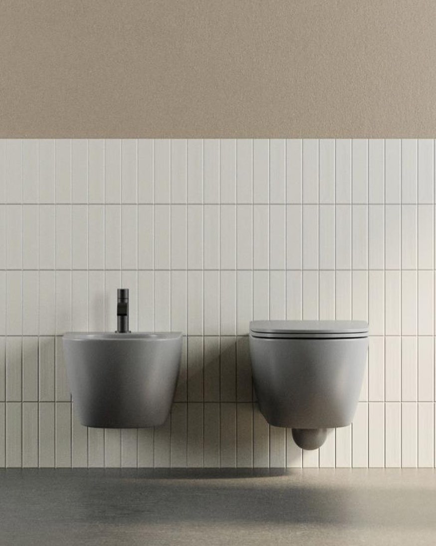Set toilet and bidet wall-mounted in matte Cemento, collection Pin, from NIC Design